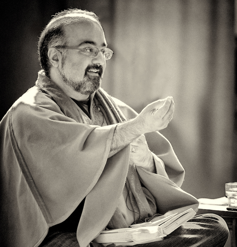 Cepia toned photo of man in religious garments